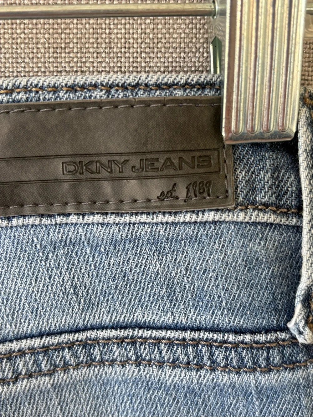 DKNY soho boot Women's Light Wash Blue Jeans size 6 fringe hem.